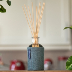 Diffusore ambiente con bastoncini rivestito in lana color verde bosco
